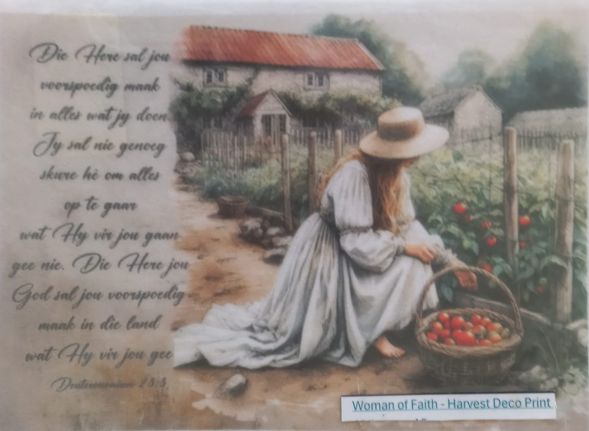 A square decoupage print featuring a vintage-style illustration of a woman in a white dress harvesting tomatoes from a basket in a garden, alongside Dutch scripture text. The print is sealed in a clear plastic protective sleeve.
