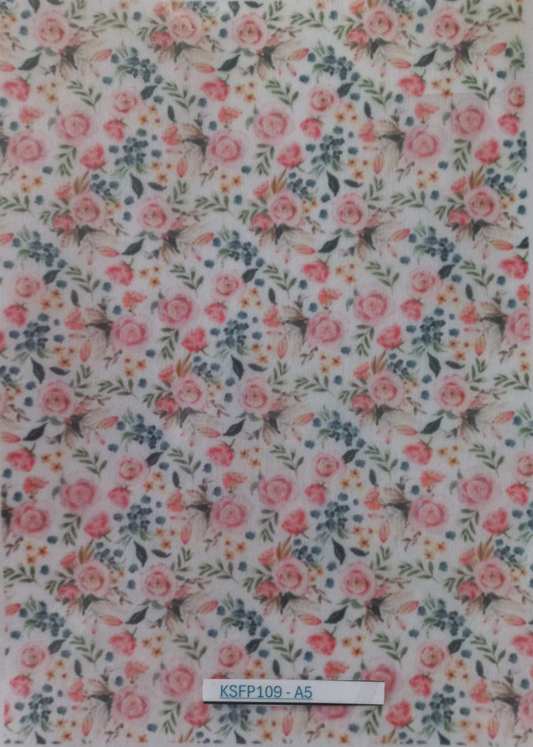 A sheet of decorative adhesive vinyl stickers featuring a dense floral and insect pattern, packaged in a clear plastic sleeve with a white backing. The pattern consists of pink and coral roses, green leaves, blue berries, and small bumblebees on a white background.