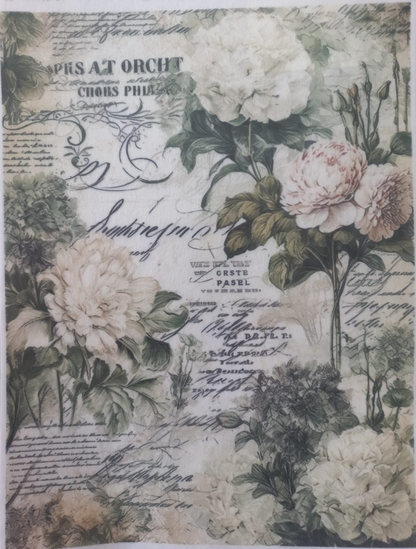 A rectangular decorative paper or fabric panel featuring a vintage floral print with large cream and blush flowers, green leaves, cursive script, and printed text elements on an aged off-white background.