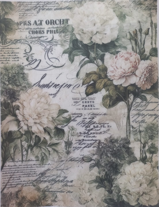 A rectangular decorative paper or fabric panel featuring a vintage floral print with large cream and blush flowers, green leaves, cursive script, and printed text elements on an aged off-white background.
