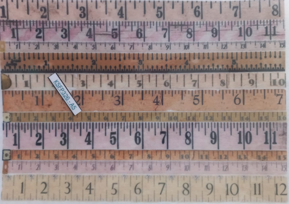 A set of vintage wooden folding rulers with black printed measurements, displayed in a clear plastic sleeve. The rulers show various sizes and colors including beige, brown, and pinkish wood tones, with one ruler displaying 'AS22828-A3'.