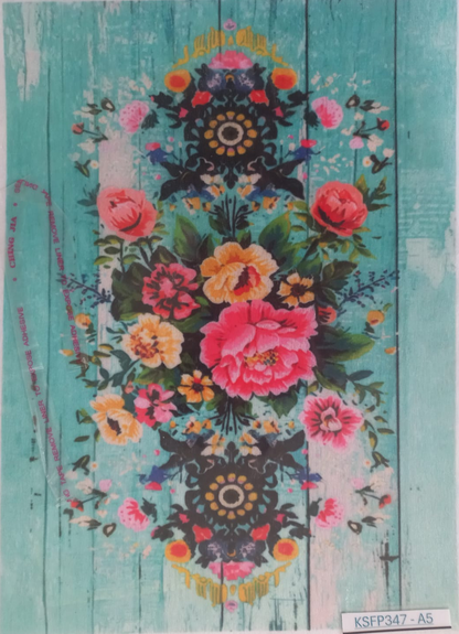 A rectangular decorative print or card featuring a colorful floral arrangement on a distressed turquoise wood-plank background, photographed flat against a white surface.