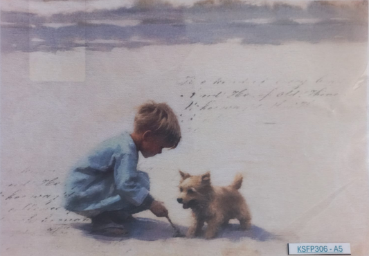 A vintage-style art print or postcard depicting a young boy in a blue shirt crouching beside a small brown dog on a pale beach or snowy ground, with faint handwritten script in the background. The print is photographed flat against a white surface with a protective sleeve visible around the edges.