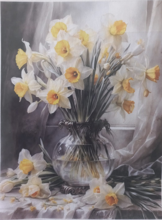 A printed floral still-life artwork showing white and yellow daffodils arranged in a clear glass vase against a gray draped backdrop. The print has a white border with repeated 'Gryff' text along the top and bottom edges.