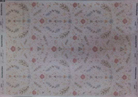 A sheet of decorative paper stickers or decals featuring a repeating botanical pattern with pink flowers, green leaves, and small blue accents on a white background, with printed text along the borders.