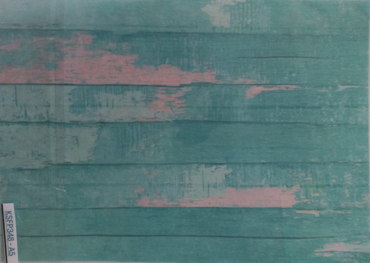 A rectangular printed backdrop or card featuring a distressed teal wood plank pattern with patches of pink and off-white, photographed flat against a light background.