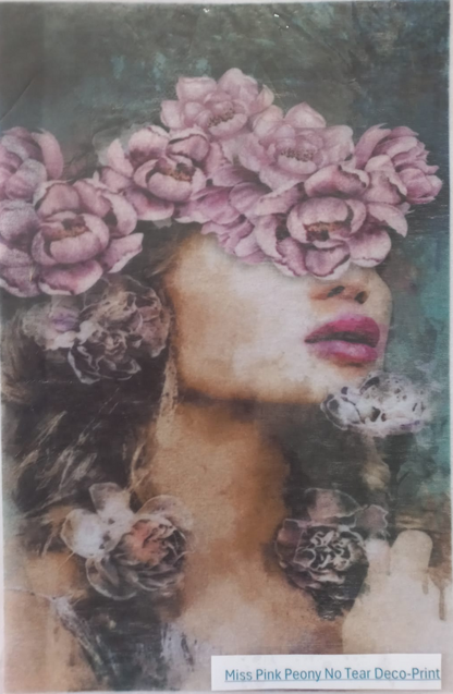 A square decoupage print featuring a woman's face with pink flowers around her eyes and hair, labeled 'Miss Pink Peony No Tear Deco-Print' at the bottom.
