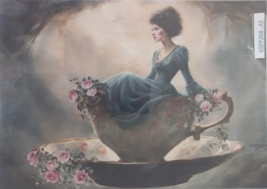 A vintage-style art print depicting a woman in a blue gown sitting inside a large floral teacup and saucer, photographed against a white background with a small vertical label reading GSP2981_A5.