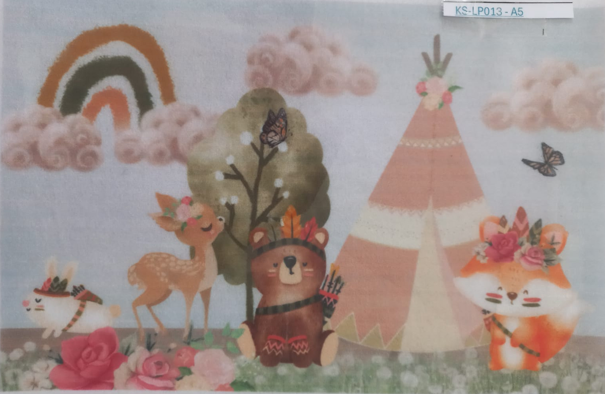A square art print or card featuring a whimsical woodland scene with a deer, bear, rabbit, and fox around a teepee, flowers, clouds, and a rainbow. The artwork has a light blue sky background and is photographed inside a clear plastic sleeve.
