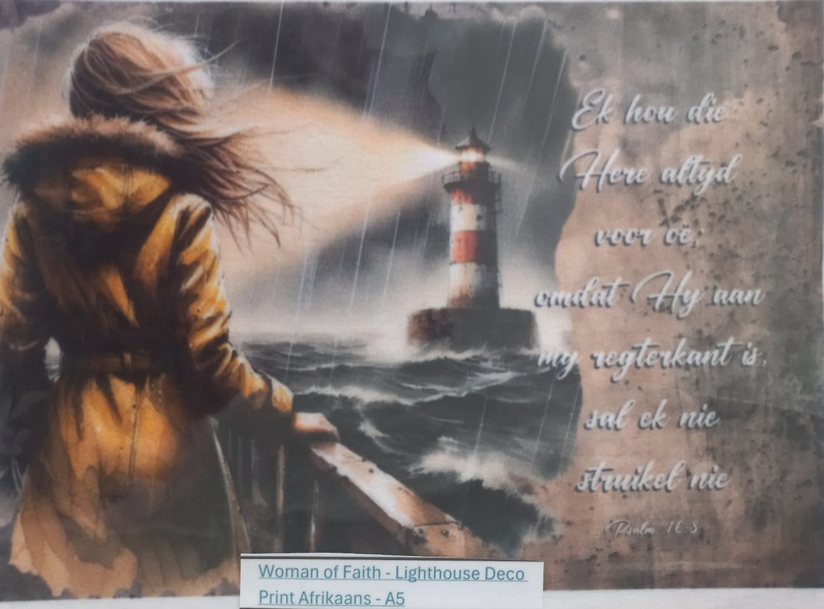 A square art print or decoupage featuring a dramatic seascape with a woman in a yellow coat looking toward a lighthouse at night in the rain, with Dutch text overlaid on the right and a small label at the bottom reading 'Woman of Faith - Lighthouse Deco'.